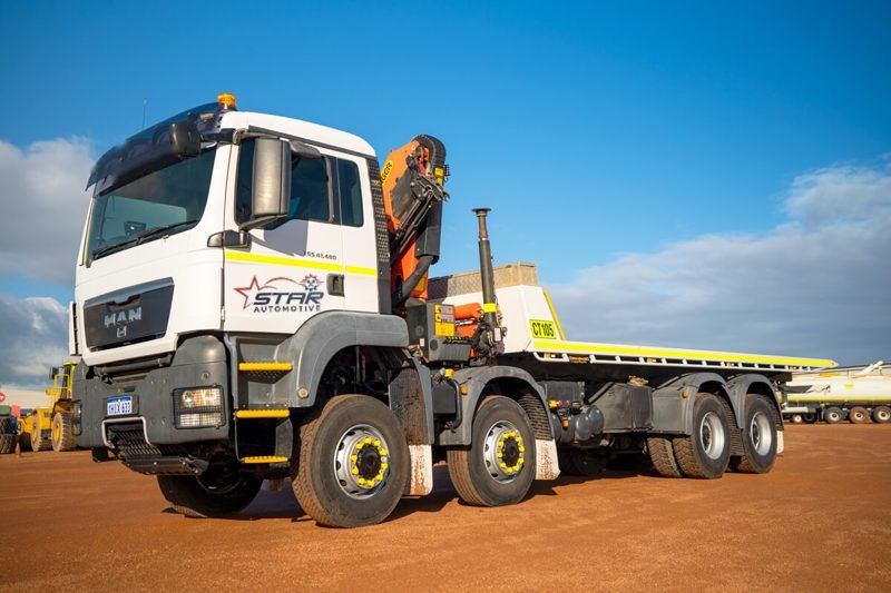 MAN 8x4 crane truck with flat top